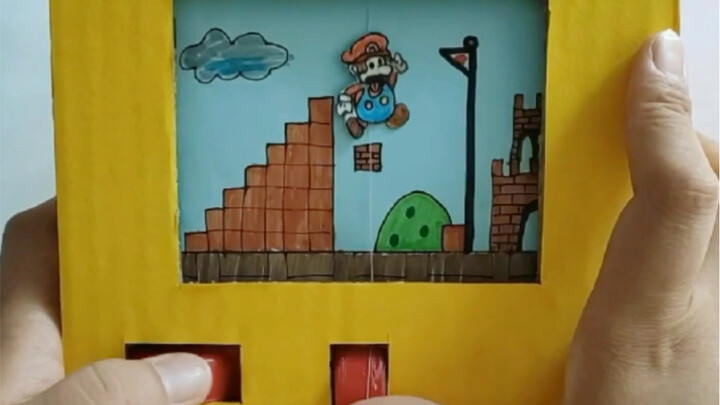 DIY Super Mario game console using a快递 cardboard box—simple to operate and lots of fun, bringing bac