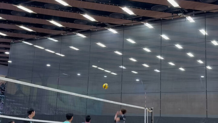 Youthful energy on the court! The volleyball match is underway.