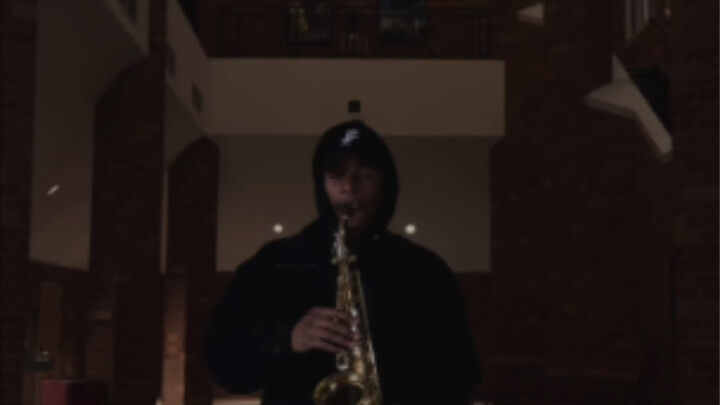 The sound of a saxophone in a large room
