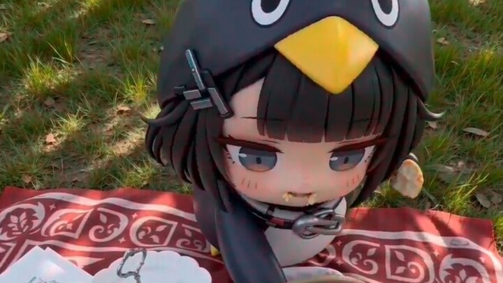 Pelican snatches food from penguin