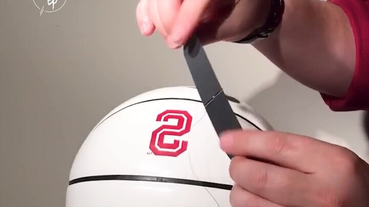 Its surface has no glue and no sticky substances, but when placed on a basketball and gently lifted,