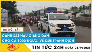 Hình ảnh Cảnh sát Hậu Giang dẫn đường cho gần 1000 người dân tự đi xe máy về quê tránh ùn ứ tại chốt