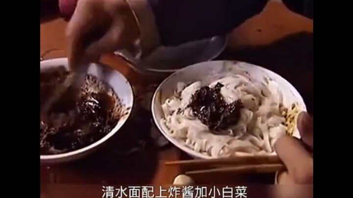 Hand-pulled noodles with savory fried bean sauce and baby bok choy. Add two cloves of garlic! Even I