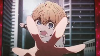 Two people jump down from the building together.