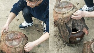 A man dug up a bottle of old wine that he had buried 30 years ago. He opened it with great joy, but 