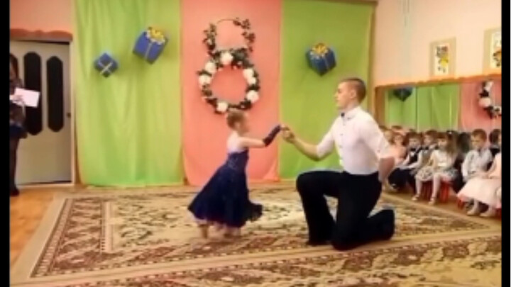 A father learned to waltz for his daughter's holiday in kindergarten.