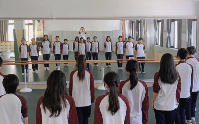 High school students dance violeta in unison