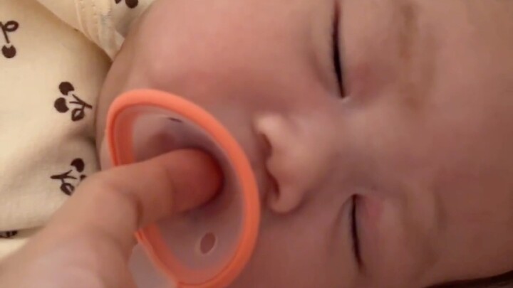 When I slipped my hand into the baby’s mouth…