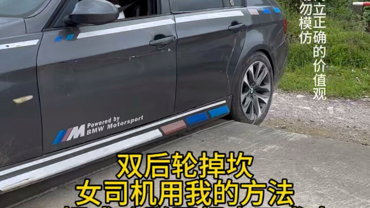 Female driver with dual rear wheels successfully escapes a pothole using my method