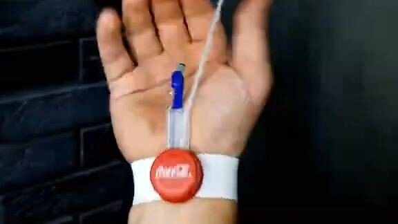 WOW How to make a Spider-Man web-shooter out of a Coca-Cola bottle cap. Tutorial