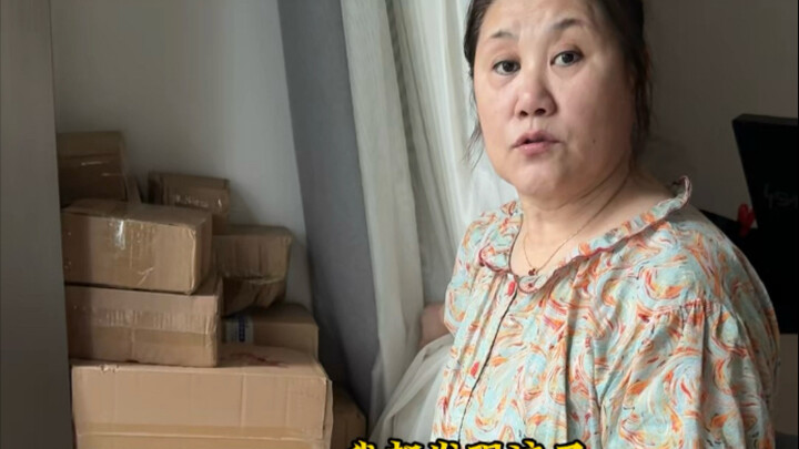 There is a mother at home who loves playing with toys!