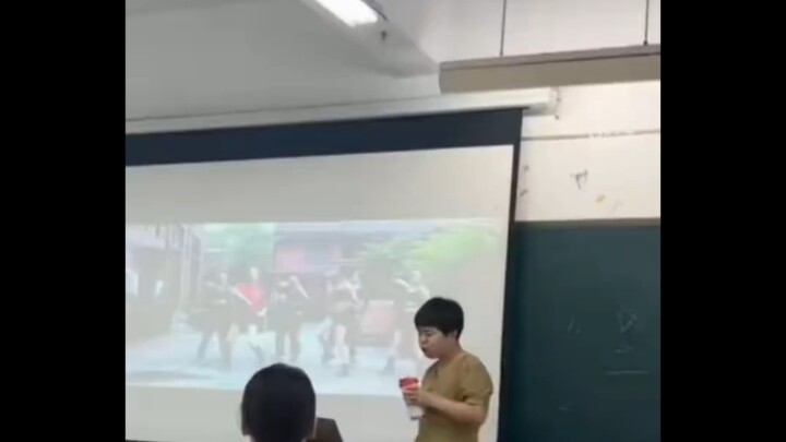 The teacher shows his students the street dance he used to do when he was young.