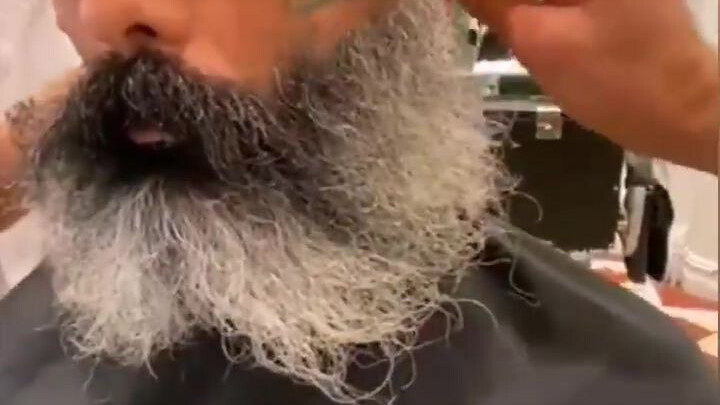 The barbershop gave the bearded uncle a "face cleanup" and he looked at least ten years younger afte
