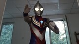 Trở thành Ultraman Tiga và biến thành ba dạng nhờ các hiệu ứng đặc biệt của Black Prison Heartbroken