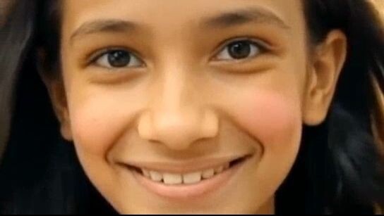 A dreamy expression on the girl's face as she daydreams about h