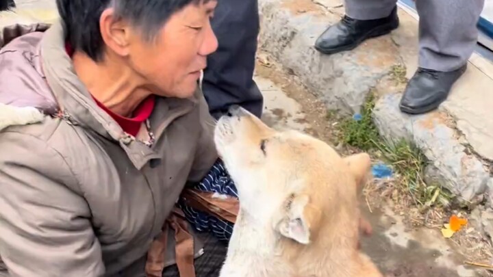 The elderly man comes out to sell his dog, reluctant to part with him.