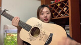 A girl covered Taylor Swift's "Love Story" with guitar with TY's sign