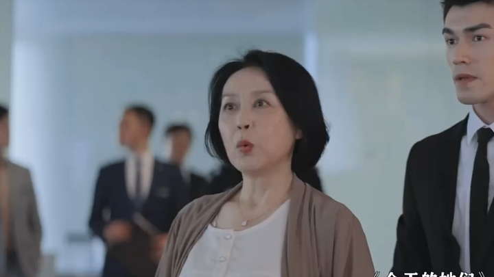 Female CEO fiercely confronts a momma’s boy