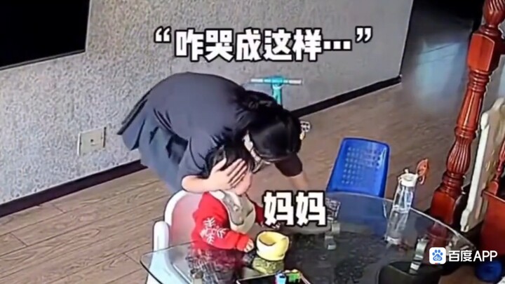Dad encourages the baby to feed themselves. The baby is happily eating, but bursts into tears as soo