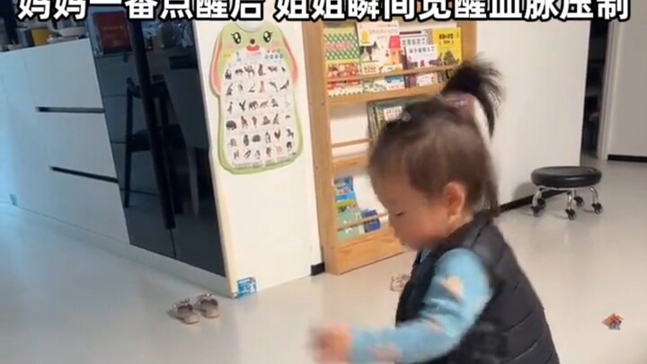 Sis hits the floor, getting smacked in the face by her little brother and bawling—until Mom gives he