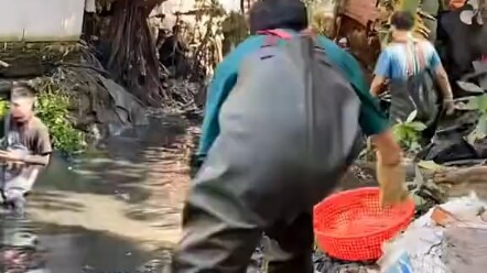 Clearing Trash from the River Channel