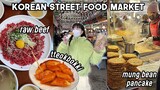 Mukbang at Korean Street Food Market: spicy rice cake, Korean pancakes, raw beef, dumplings | Q2HAN