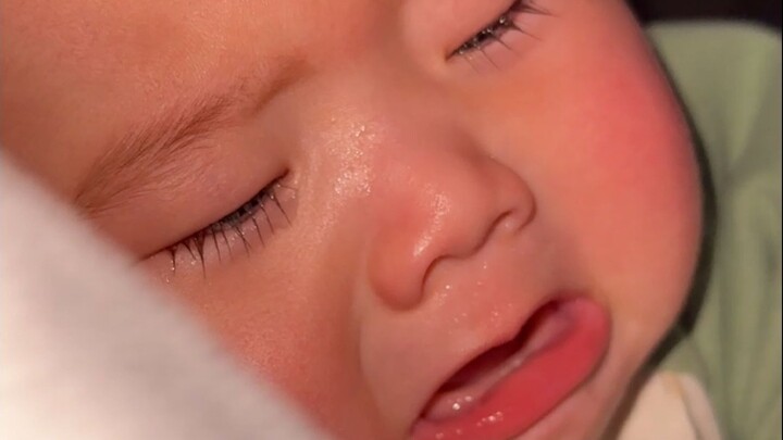 Baby bites while nursing, and I ignore him—he just lies beside me, looking utterly forlorn. I secret