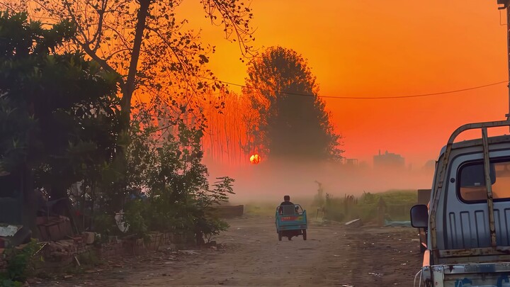 “Only green hills veiled in mist, as the blazing sun peers down to behold the world”