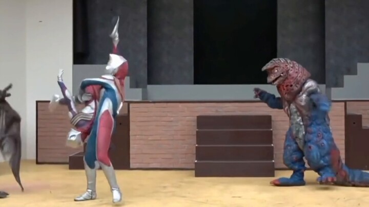 Dyna: It's none of my business!! Tiga: He's my brother and he's ignorant!! ?
