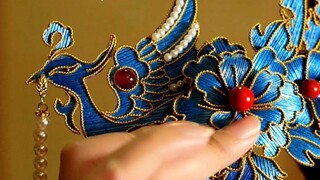 Ồ! 2 bắp ngô thực sự có thể làm một chiếc kẹp tóc phượng hoàng bằng ngọc lục bảo! Anh ấy là người gi