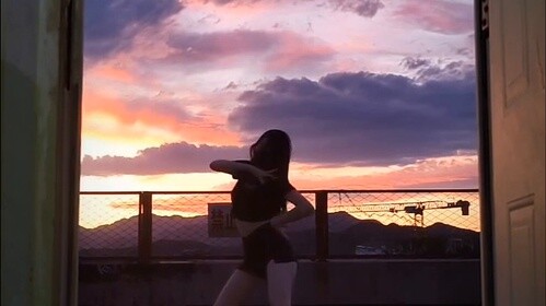 "Go Hard" on the rooftop under the sunset