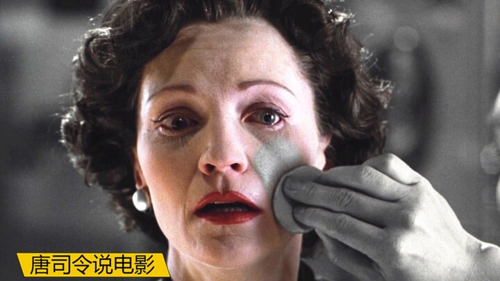 In a black-and-white world, color simply can't exist—so the woman has no choice but to apply gray fo