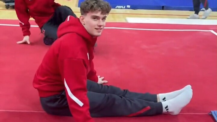 Men’s gymnastics team demonstrates: how to sit down without bending your knees. They’re not only cre