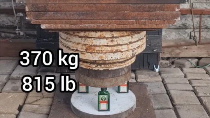 Strength test of a Jägermeister bottle _science _satisfying