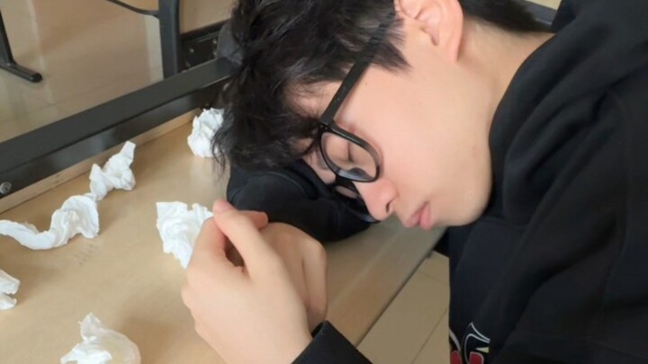 My roommate fell asleep in class—give him a hand!