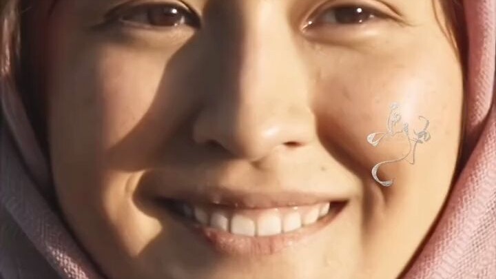 A radiant, resilient flower blooms in bitter waters