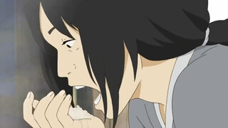 The woman lifted the lid of the pot, scooped up half a handful of uncooked rice and stuffed it into 
