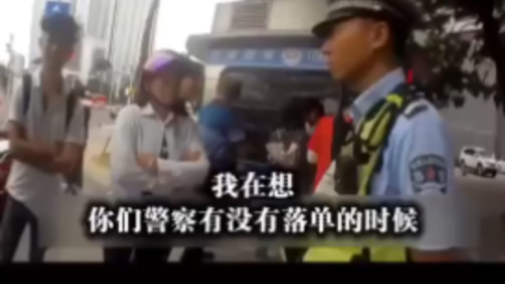 An electric scooter illegally carrying overloaded passengers—yet the passenger brazenly brandished a