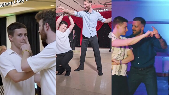 Dua pria menari berpasangan, suasana ini sungguh penuh dengan ketegangan romantis