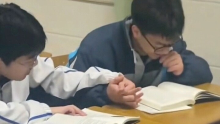 Holding hands while doing homework doesn’t feel so tiring anymore!