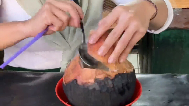 这世界上怎么会有人喜欢喝热椰子汁。