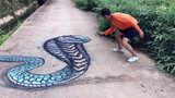 Đời sống|Vẽ rắn trên đường
