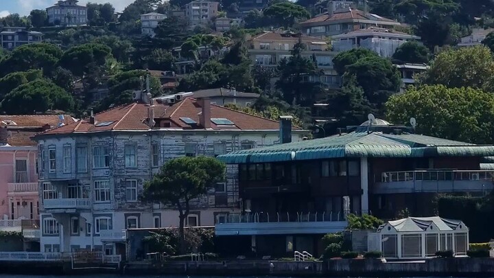 Sailing smoothly along the historic Bosphorus shore on a sunny day. 🛥️☀️