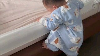 At 14 months old, he is really independent and goes to bed by himself when he is sleepy.