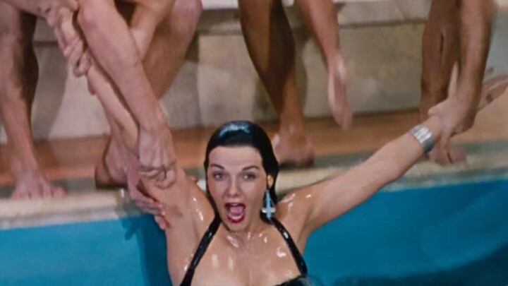Actress accidentally falls into the pool, creating a classic moment in film history