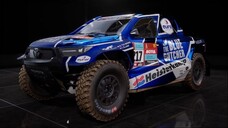 Car Toyota GR DKR Hilux in Dakar Desert Rally. Toyota overdrive