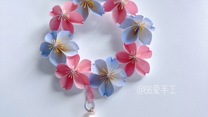 Considering how close we are, it’s not too much to ask you to handmake a cherry blossom wreath charm