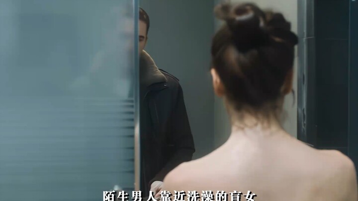 A woman is taking a bath at home, unaware that her husband has already been murdered.