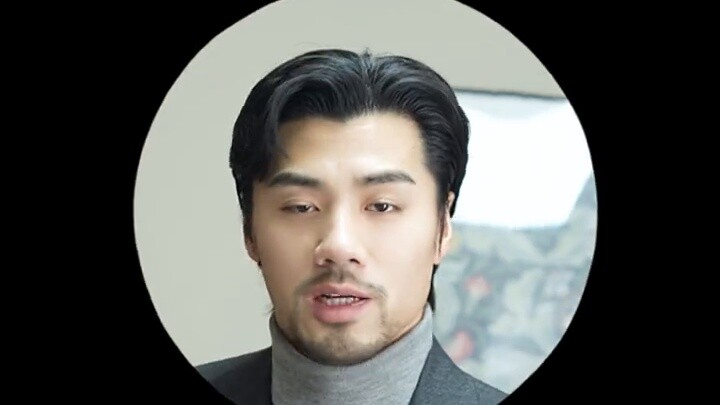 Leather shoes with white socks, one wears a silent