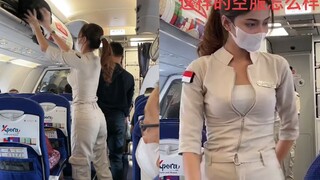 男子乘国外航班被空姐惊艳，短袖加长裤平底鞋一身飒气：气质拉满